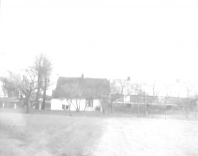 Boerderij "Nationale Uitgestelde Schuld", van W. Miltenburg, zijaanzicht
